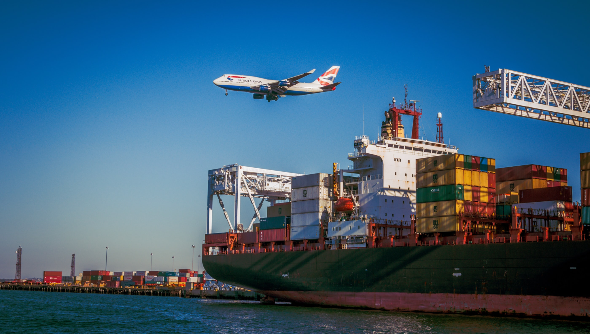 Airplane and cargo freighter fulfilling ecommerce orders.