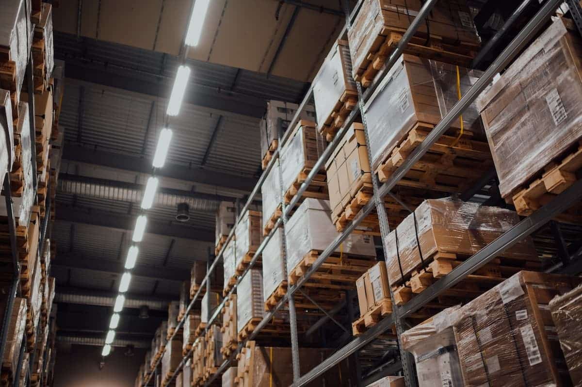 Shelves with full pallets in a warehouse.
